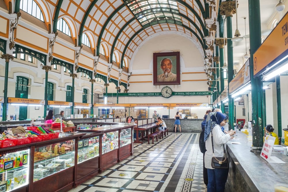 Interior of the French-built General Post Office in Ho Chi Minh City with vaulted ceilings, colonial architecture and historic postal counters